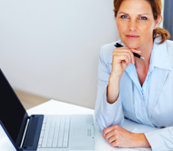 Business woman working at laptop