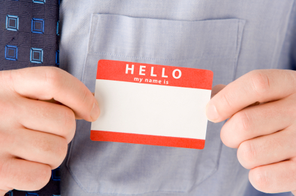 Businessman Attaching Name Tag