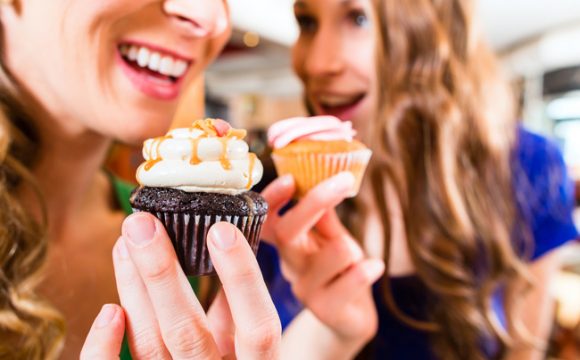 satisfied customers having cupcakes