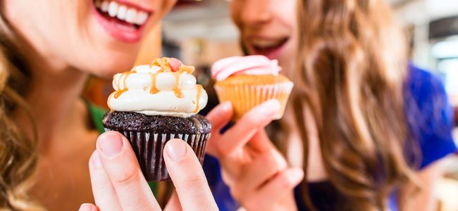 satisfied customers having cupcakes