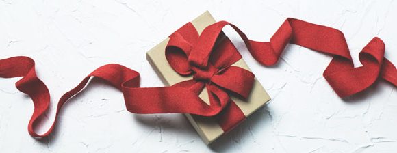 Gift box and red ribbon