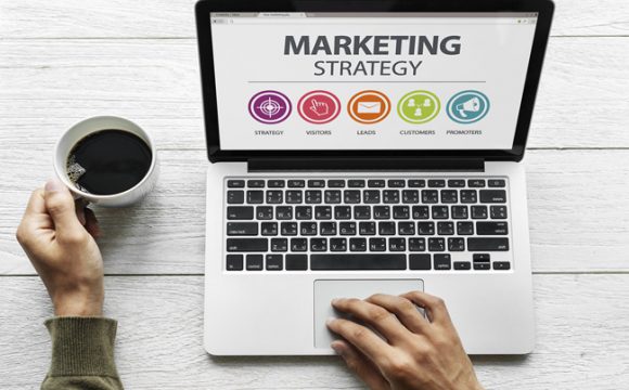 Marketing Strategy Computer on table