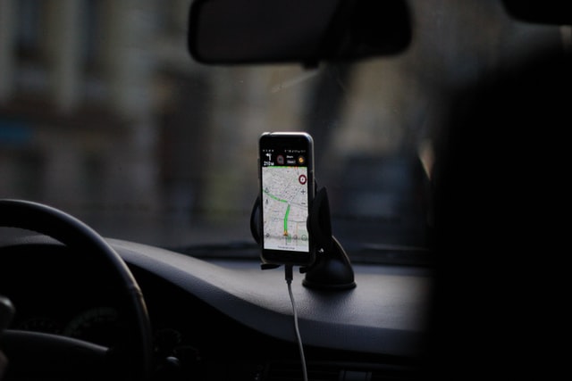 smartphone providing directions in the car