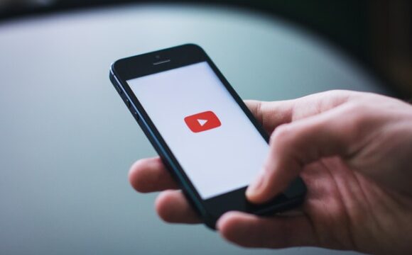 YouTube logo on a smartphone
