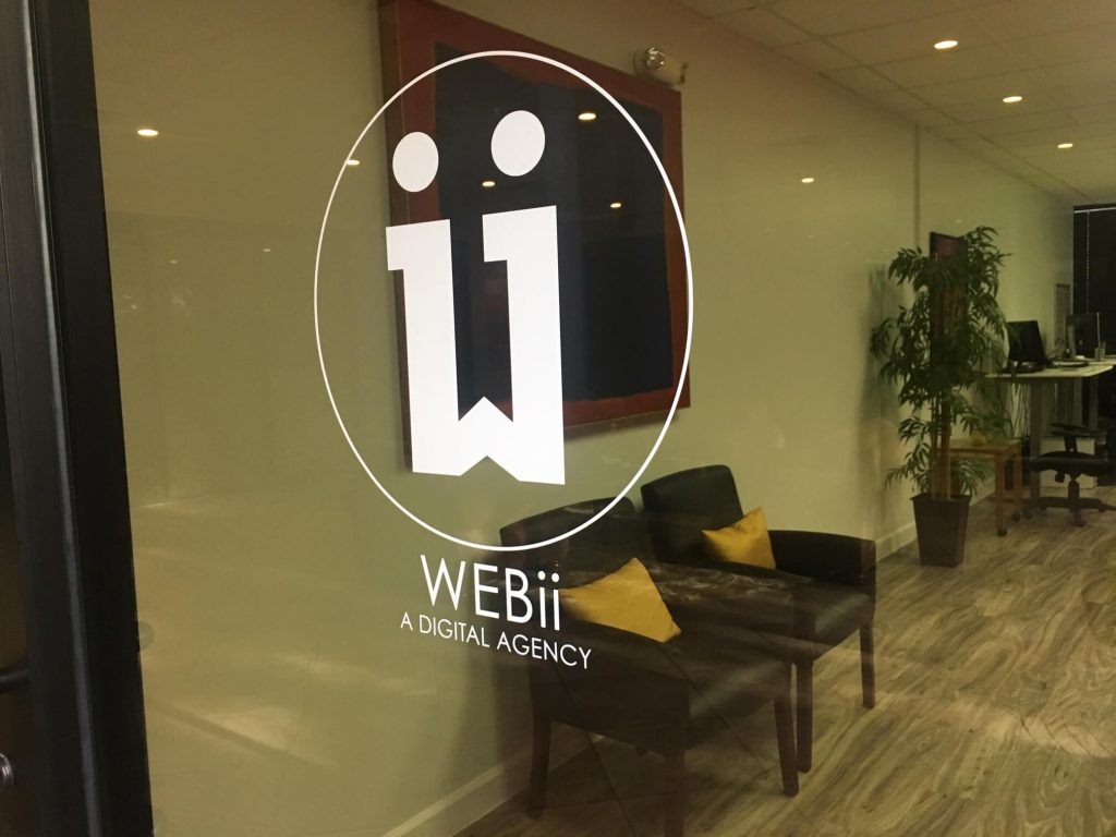 WEBii door signage in Austin